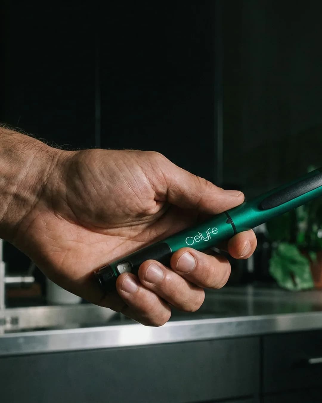 Celyfe precision pen held in a hand